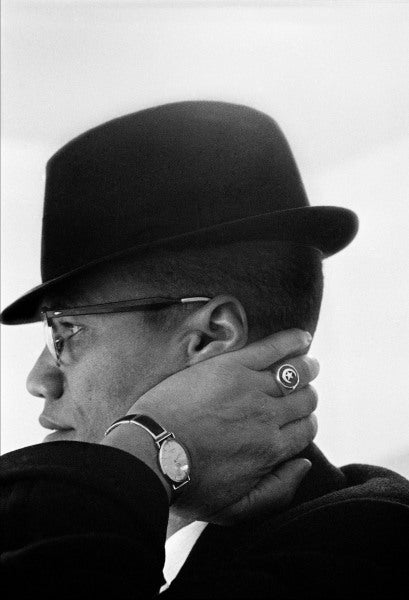 Eve Arnold: Malcolm X During His Visit to Enterprises Owned by Members of the Nation of Islam, 1961