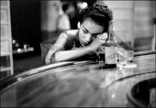 Eve Arnold: Bar Girl in a Brothel in the Red Light District, 1954